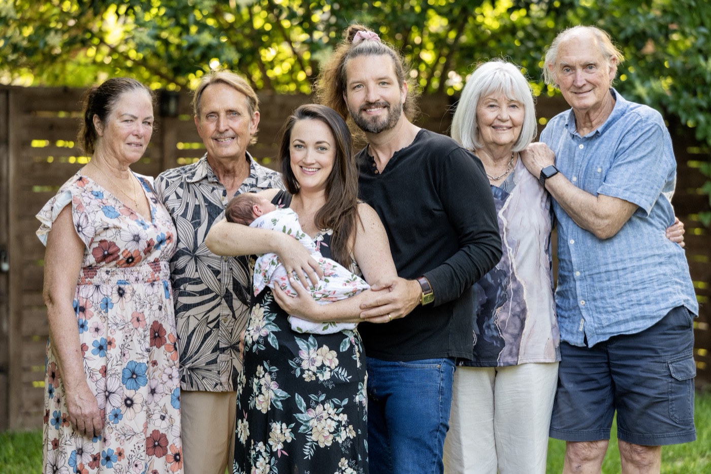 Erick, Alyssa, their daughter Isabella, and family